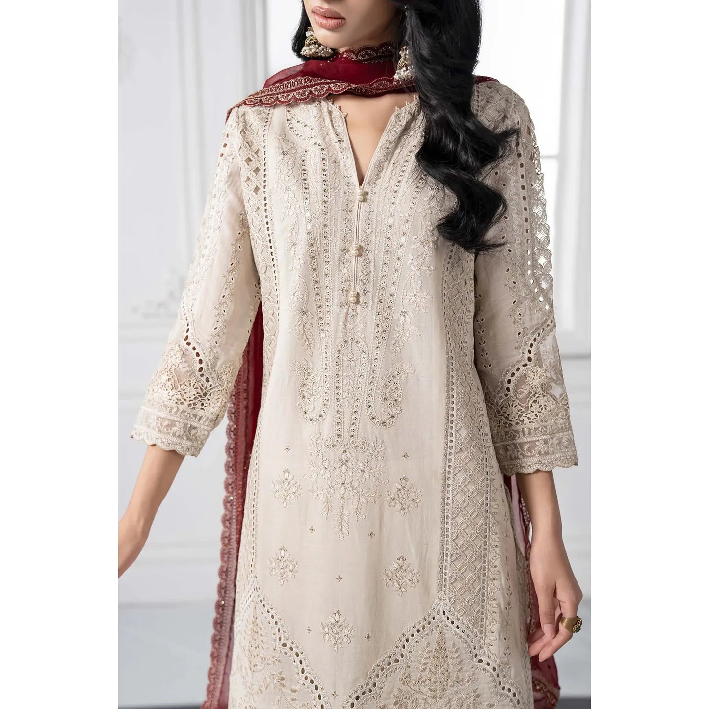 • Clothing: Embroidered/Printed suit for women - Made of best quality fabric - lawn or linen or chiffon - pure silk - Available at Najma Designs & Co. • Jewelry: Gold - plated stud earrings for