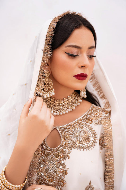 • Clothing: Embroidered/Printed suit for women - Made of best quality fabric - lawn or linen or chiffon - pure silk - Available at Najma Designs & Co. • Jewelry: Gold - plated stud earrings for