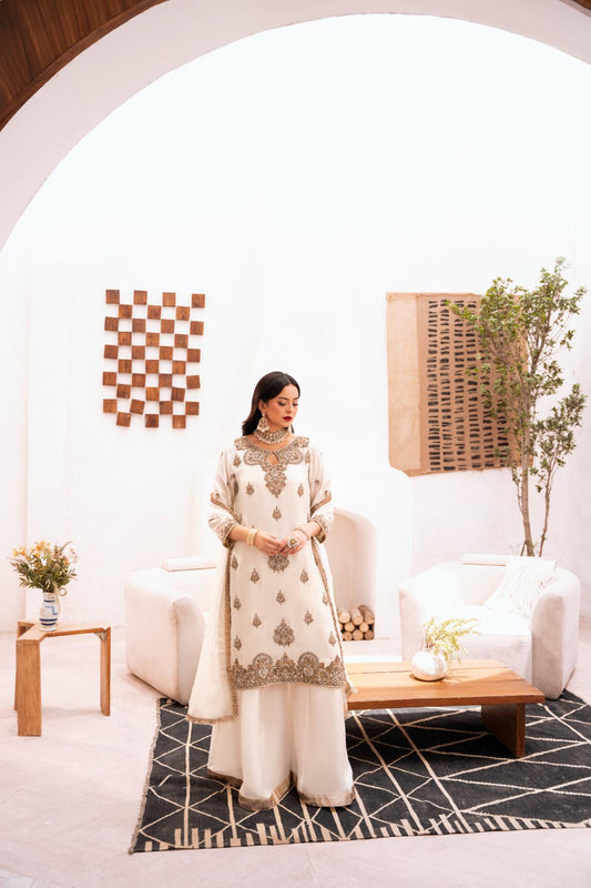 • Clothing: Embroidered/Printed suit for women - Made of best quality fabric - lawn or linen or chiffon - pure silk - Available at Najma Designs & Co. • Jewelry: Gold - plated stud earrings for