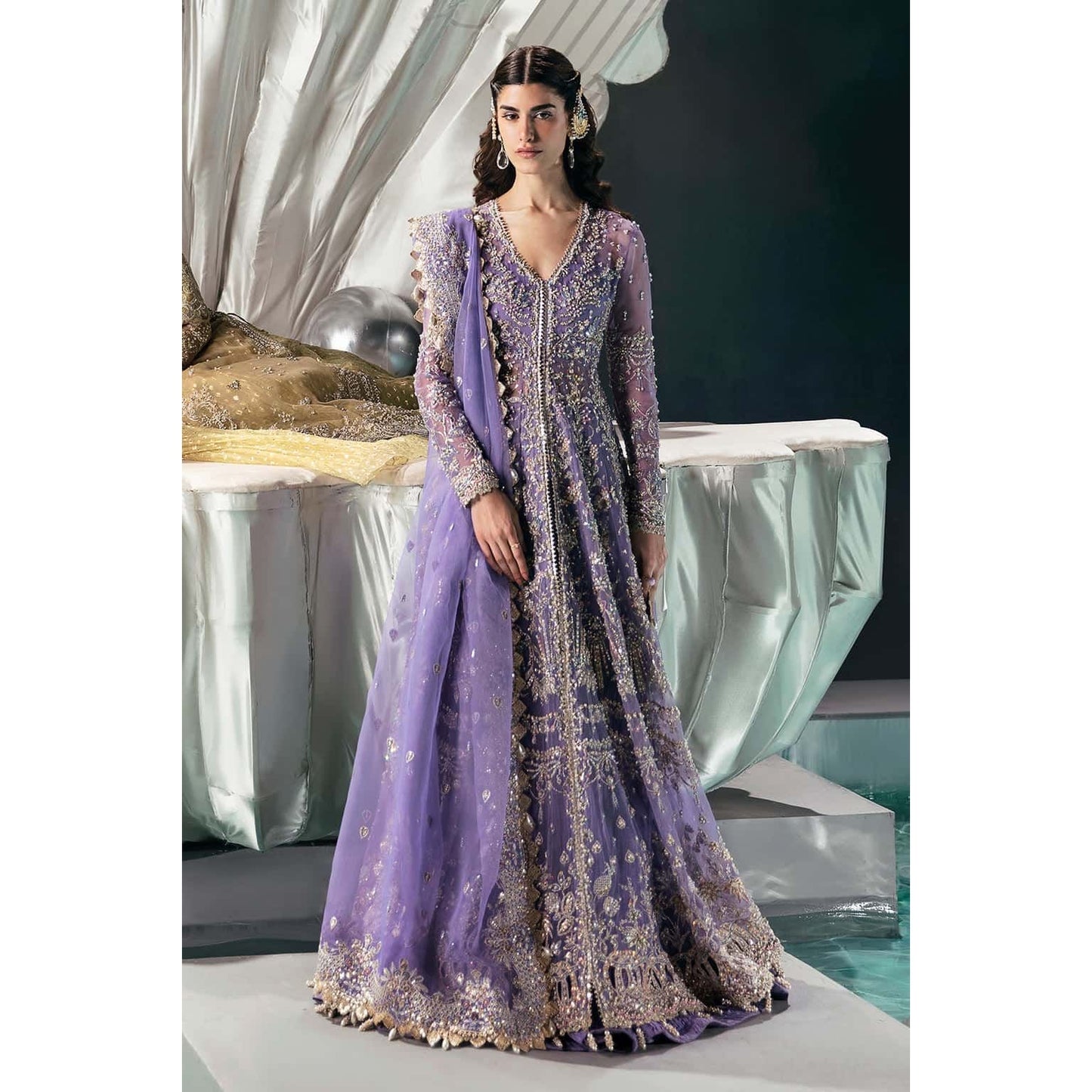 • Clothing: Embroidered/Printed suit for women - Made of best quality fabric - lawn or linen or chiffon - pure silk - Available at Najma Designs & Co. • Jewelry: Gold - plated stud earrings for