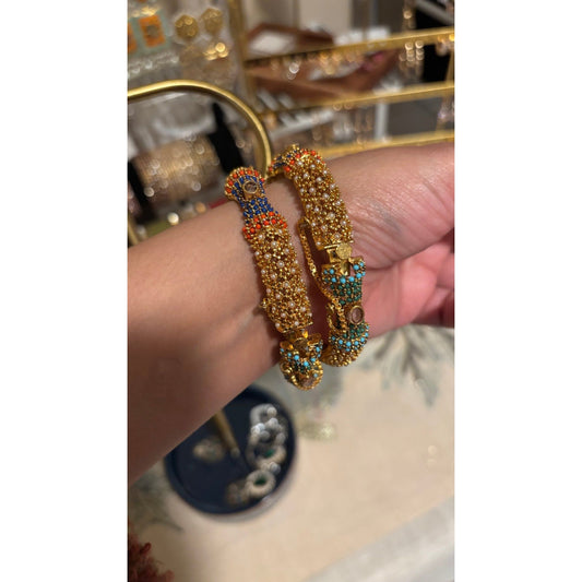 • Clothing: Embroidered/Printed suit for women - Made of best quality fabric - lawn or linen or chiffon - pure silk - Available at Najma Designs & Co. • Jewelry: Gold - plated stud earrings for