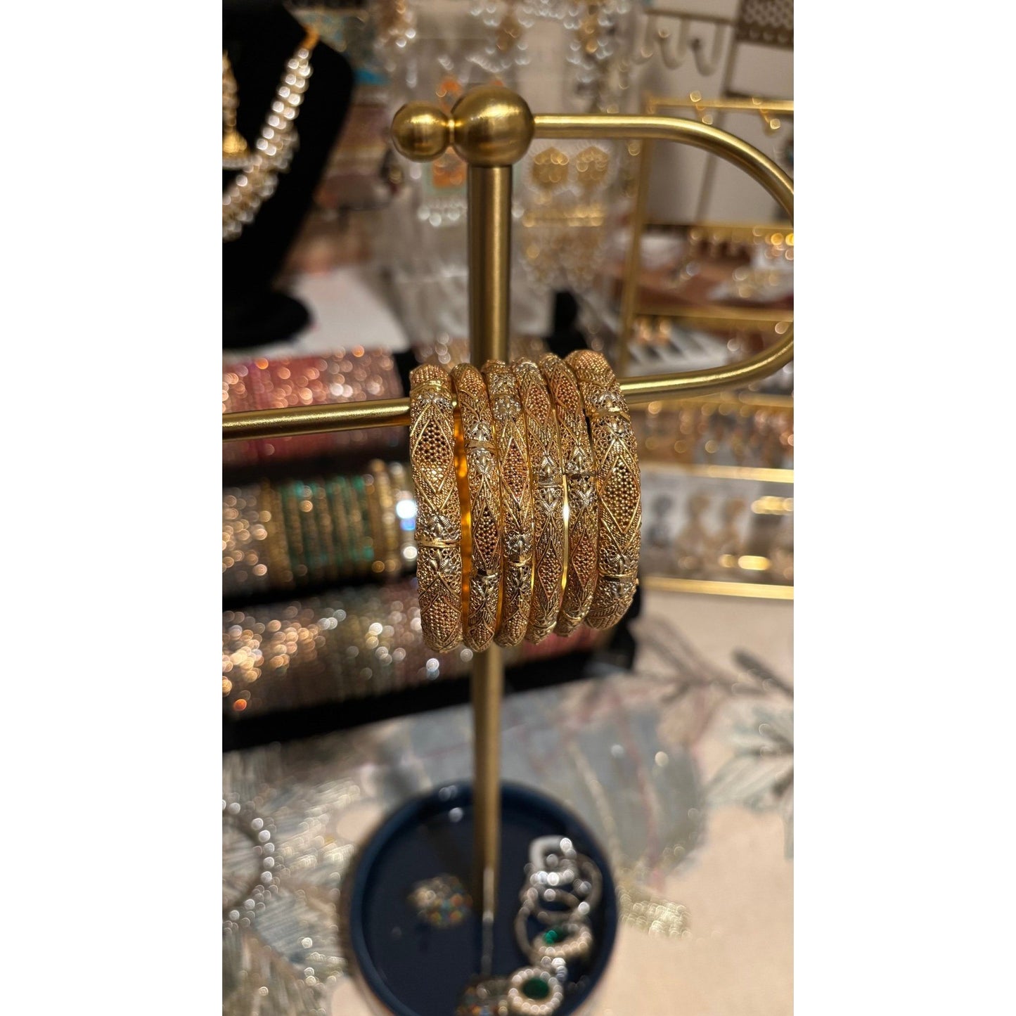 • Clothing: Embroidered/Printed suit for women - Made of best quality fabric - lawn or linen or chiffon - pure silk - Available at Najma Designs & Co. • Jewelry: Gold - plated stud earrings for