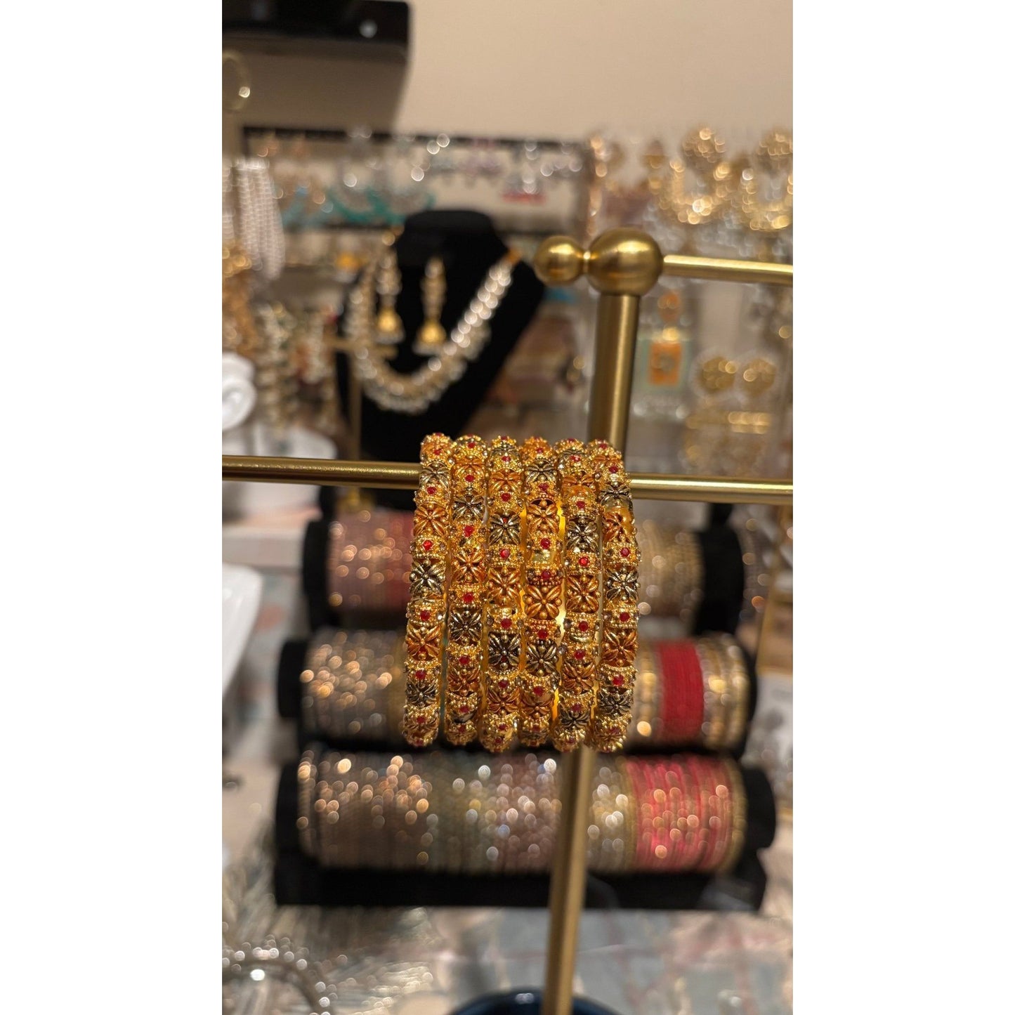 • Clothing: Embroidered/Printed suit for women - Made of best quality fabric - lawn or linen or chiffon - pure silk - Available at Najma Designs & Co. • Jewelry: Gold - plated stud earrings for