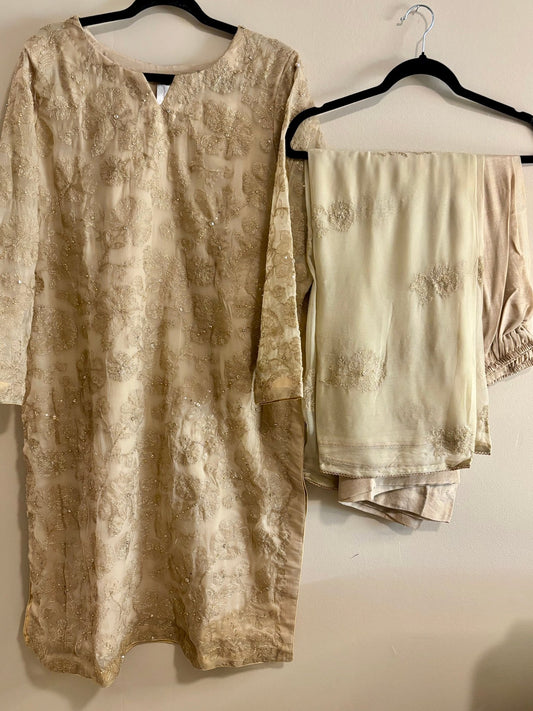 • Clothing: Embroidered/Printed suit for women - Made of best quality fabric - lawn or linen or chiffon - pure silk - Available at Najma Designs & Co. • Jewelry: Gold - plated stud earrings for