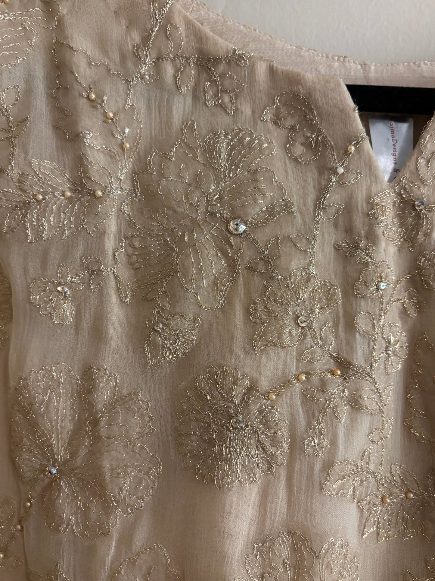 • Clothing: Embroidered/Printed suit for women - Made of best quality fabric - lawn or linen or chiffon - pure silk - Available at Najma Designs & Co. • Jewelry: Gold - plated stud earrings for