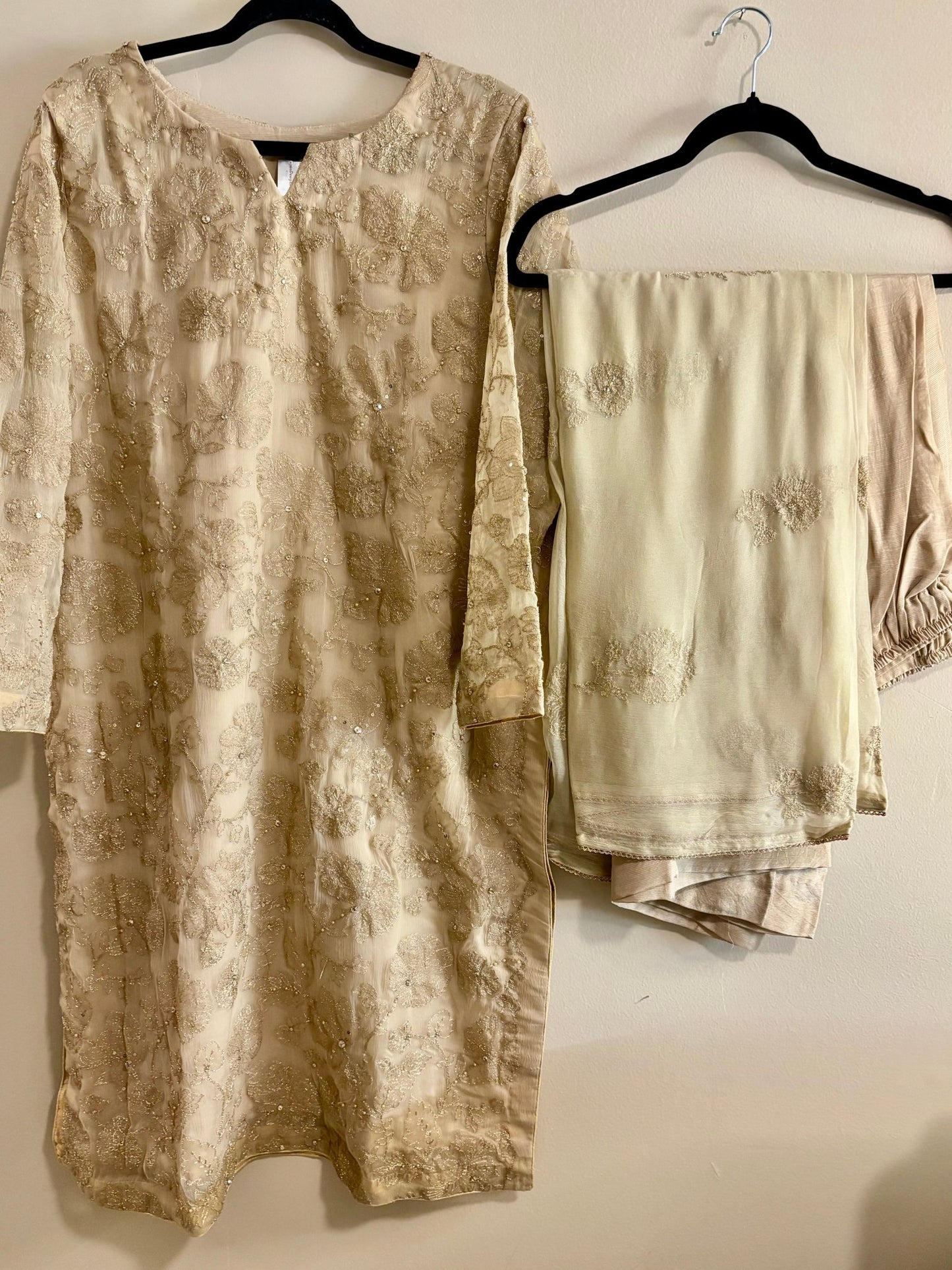 • Clothing: Embroidered/Printed suit for women - Made of best quality fabric - lawn or linen or chiffon - pure silk - Available at Najma Designs & Co. • Jewelry: Gold - plated stud earrings for
