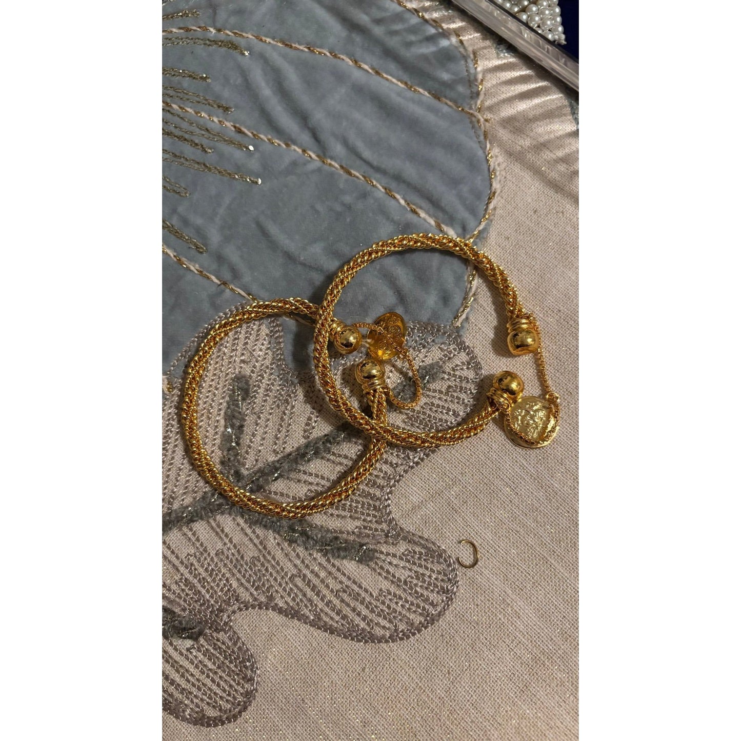 • Clothing: Embroidered/Printed suit for women - Made of best quality fabric - lawn or linen or chiffon - pure silk - Available at Najma Designs & Co. • Jewelry: Gold - plated stud earrings for