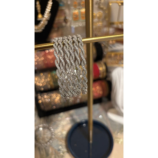 • Clothing: Embroidered/Printed suit for women - Made of best quality fabric - lawn or linen or chiffon - pure silk - Available at Najma Designs & Co. • Jewelry: Gold - plated stud earrings for