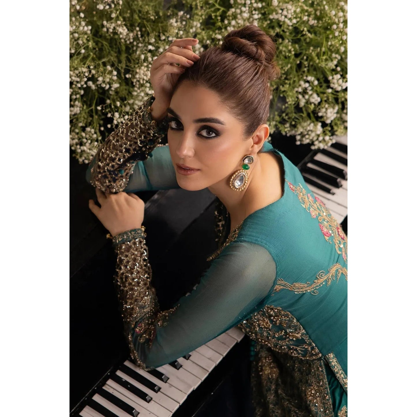 Luxury 3-piece chiffon suit with handwork embroidery, dyed organza dupatta, and raw-silk trouser for a refined look.