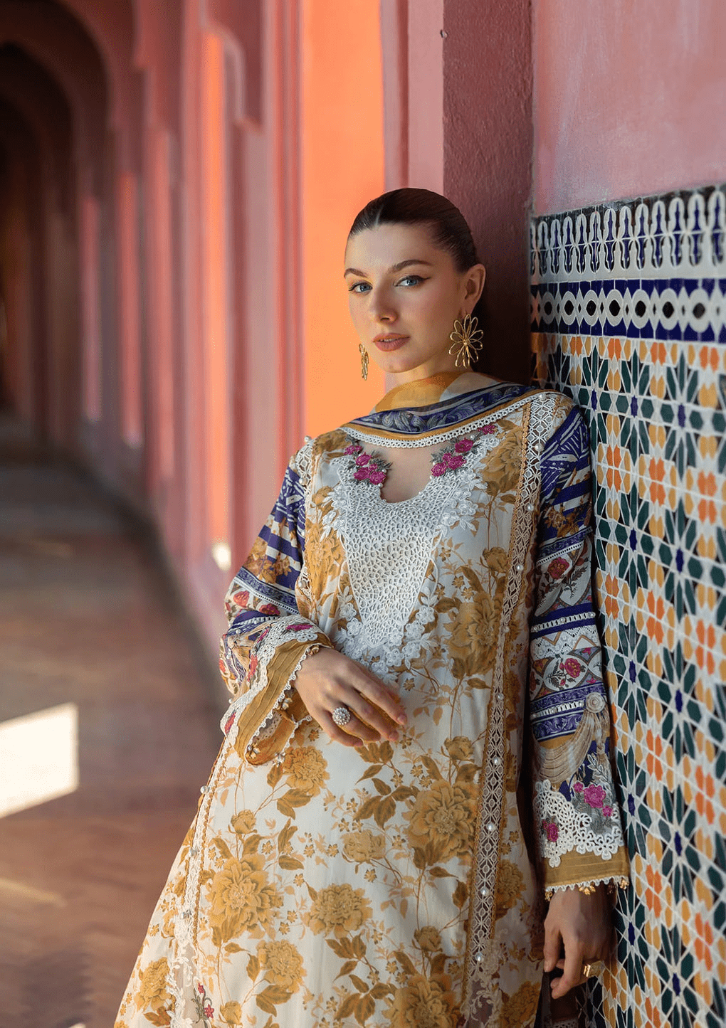• Clothing: Embroidered/Printed suit for women - Made of best quality fabric - lawn or linen or chiffon - pure silk - Available at Najma Designs & Co. • Jewelry: Gold - plated stud earrings for
