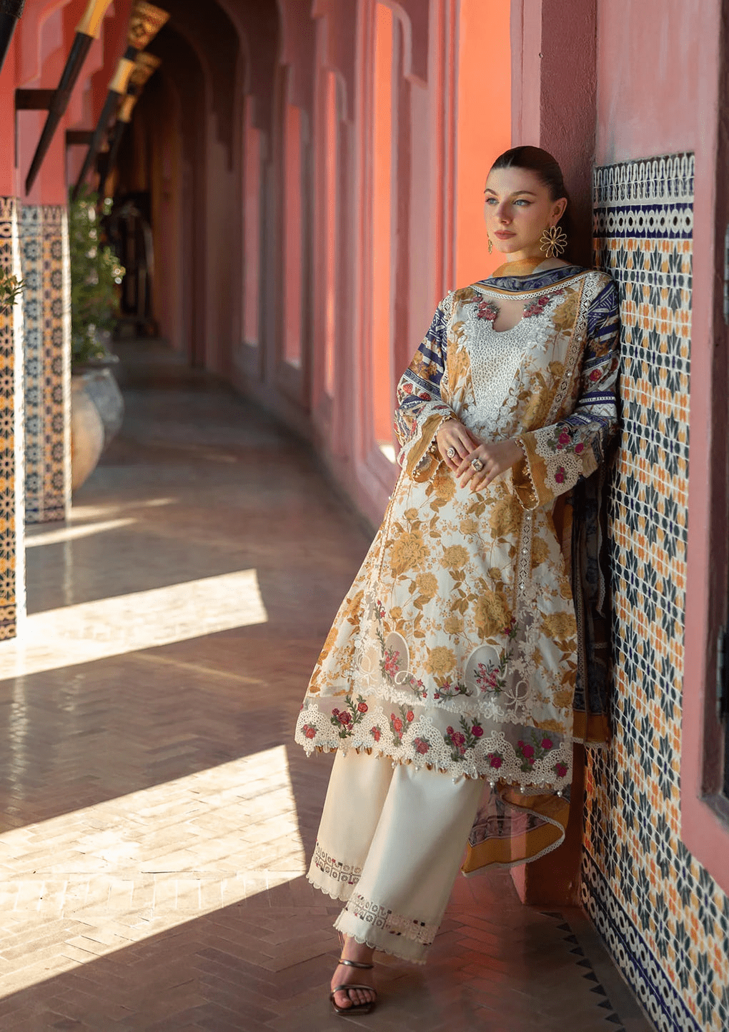 • Clothing: Embroidered/Printed suit for women - Made of best quality fabric - lawn or linen or chiffon - pure silk - Available at Najma Designs & Co. • Jewelry: Gold - plated stud earrings for