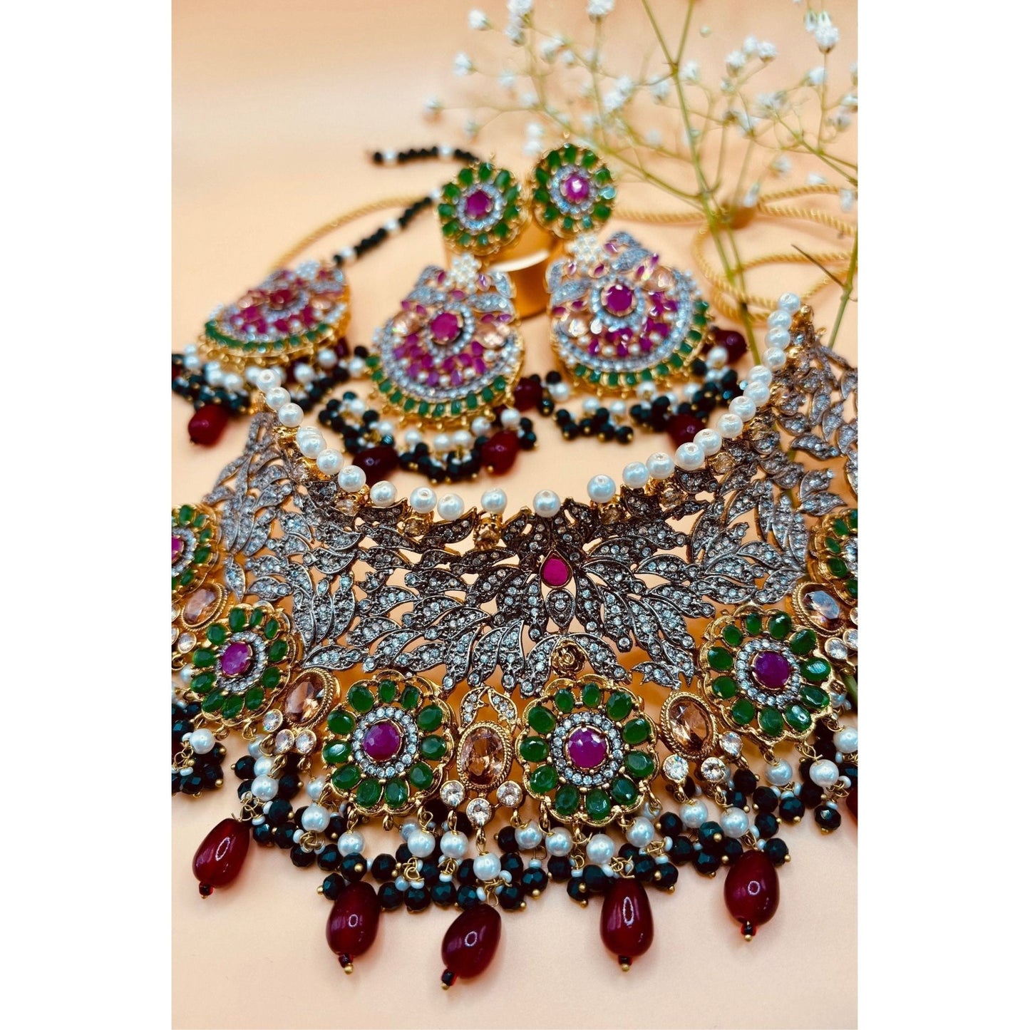 Emerald Bridal Jewelry Set with Tikka, Jhoomer Earrings, and Necklace, Embellished with Emerald, Ruby Stones, Pearl Motis, and Feroza Accents, Gold-Plated Brass, Perfect for Indian and Pakistani Brides, Adds Radiant Grace to Special Occasions, Ready to Ship"