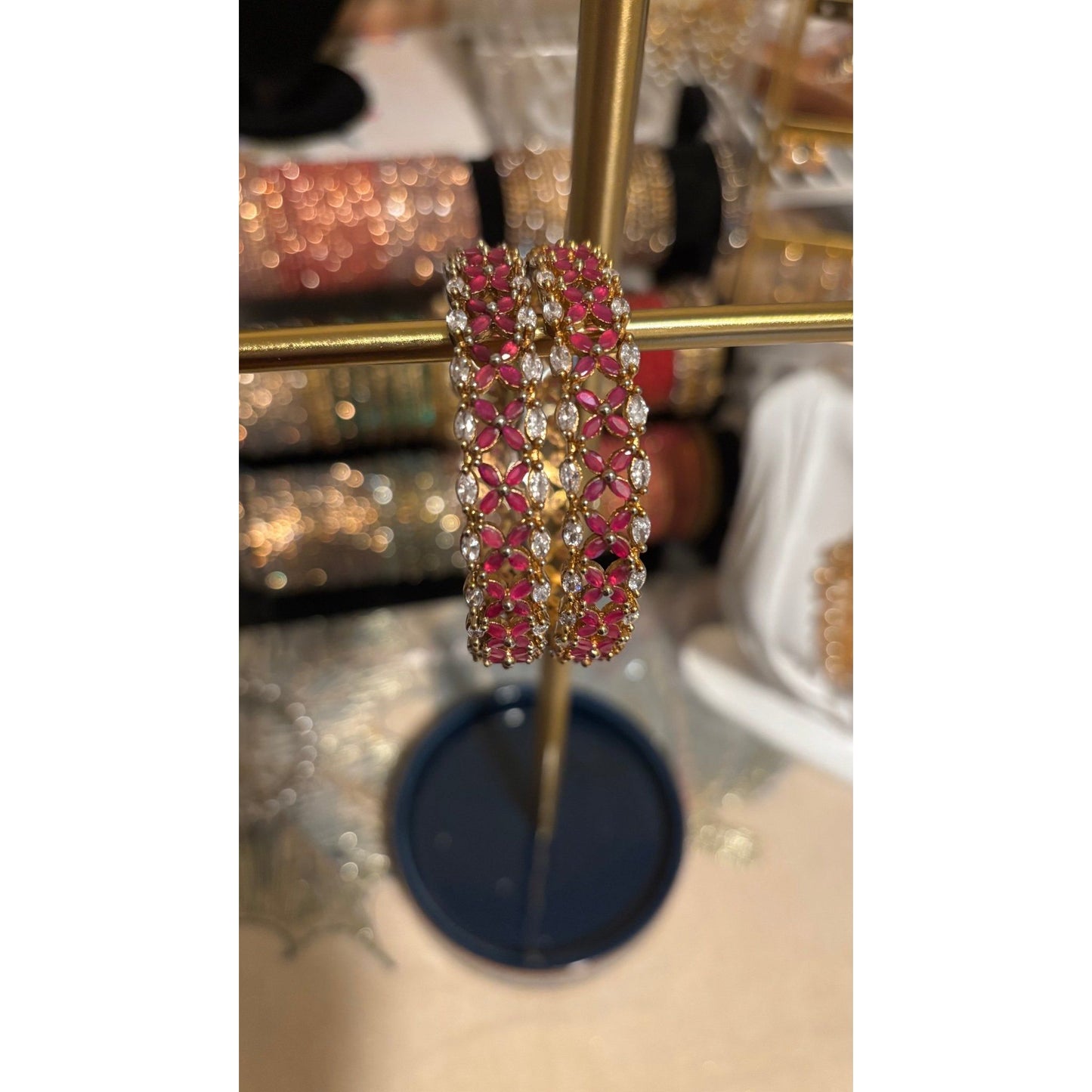 • Clothing: Embroidered/Printed suit for women - Made of best quality fabric - lawn or linen or chiffon - pure silk - Available at Najma Designs & Co. • Jewelry: Gold - plated stud earrings for