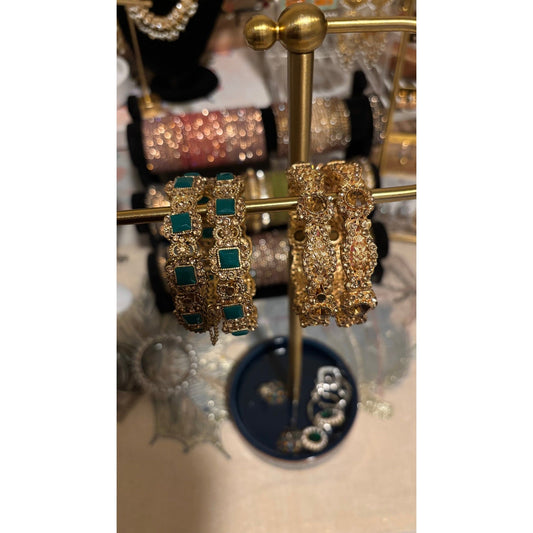 • Clothing: Embroidered/Printed suit for women - Made of best quality fabric - lawn or linen or chiffon - pure silk - Available at Najma Designs & Co. • Jewelry: Gold - plated stud earrings for