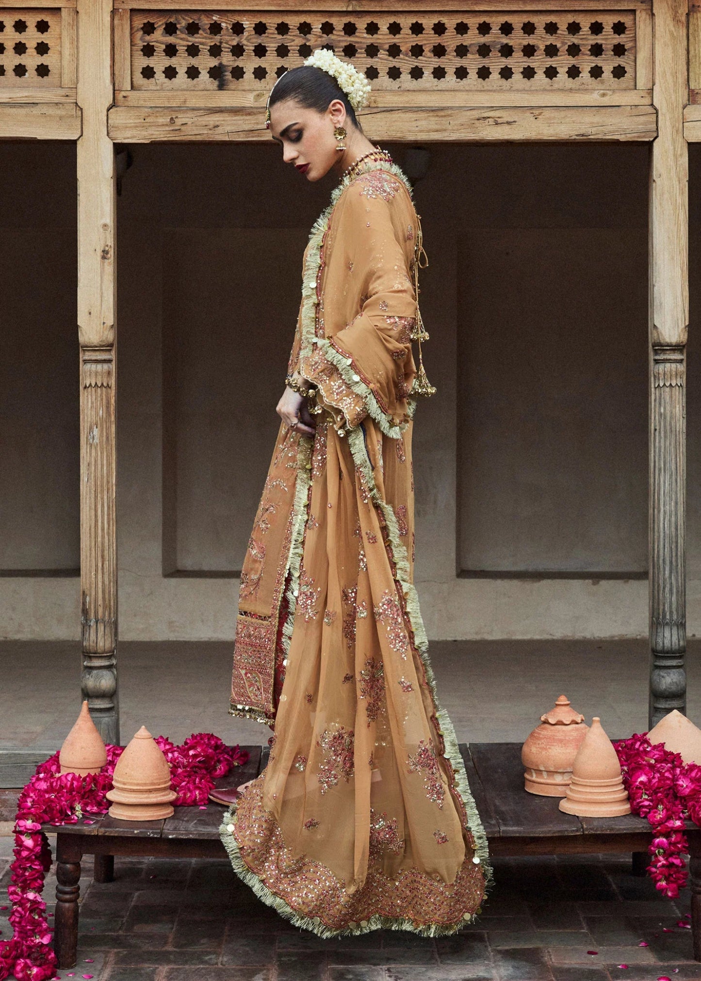 • Clothing: Embroidered/Printed suit for women - Made of best quality fabric - lawn or linen or chiffon - pure silk - Available at Najma Designs & Co. • Jewelry: Gold - plated stud earrings for