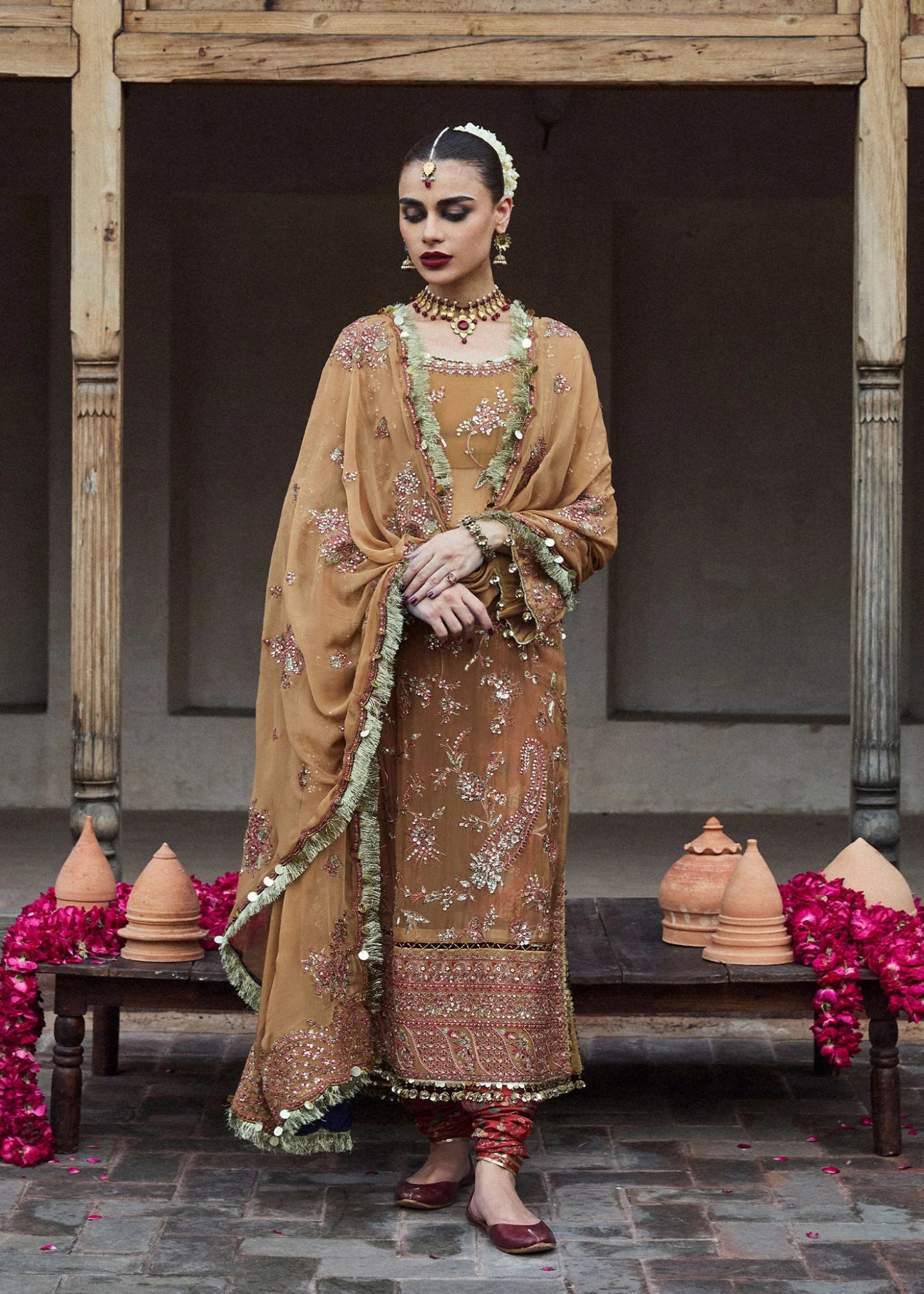 • Clothing: Embroidered/Printed suit for women - Made of best quality fabric - lawn or linen or chiffon - pure silk - Available at Najma Designs & Co. • Jewelry: Gold - plated stud earrings for