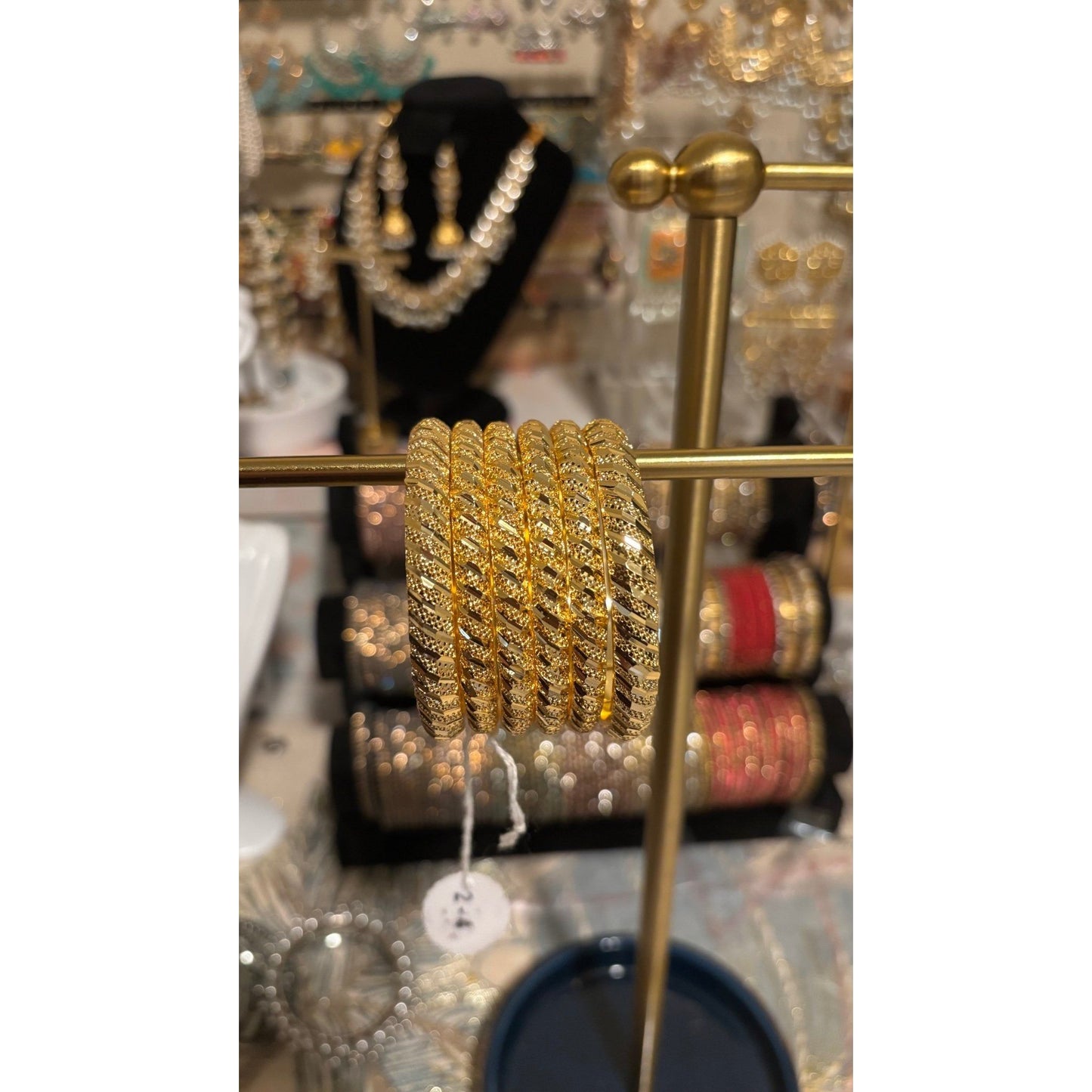 • Clothing: Embroidered/Printed suit for women - Made of best quality fabric - lawn or linen or chiffon - pure silk - Available at Najma Designs & Co. • Jewelry: Gold - plated stud earrings for