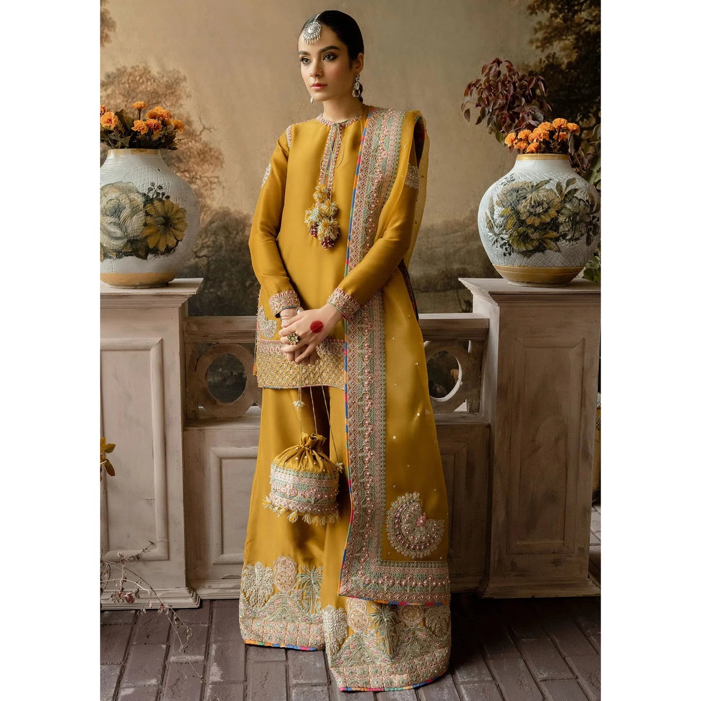 • Clothing: Embroidered/Printed suit for women - Made of best quality fabric - lawn or linen or chiffon - pure silk - Available at Najma Designs & Co. • Jewelry: Gold - plated stud earrings for
