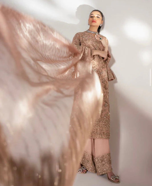 • Clothing: Embroidered/Printed suit for women - Made of best quality fabric - lawn or linen or chiffon - pure silk - Available at Najma Designs & Co. • Jewelry: Gold - plated stud earrings for