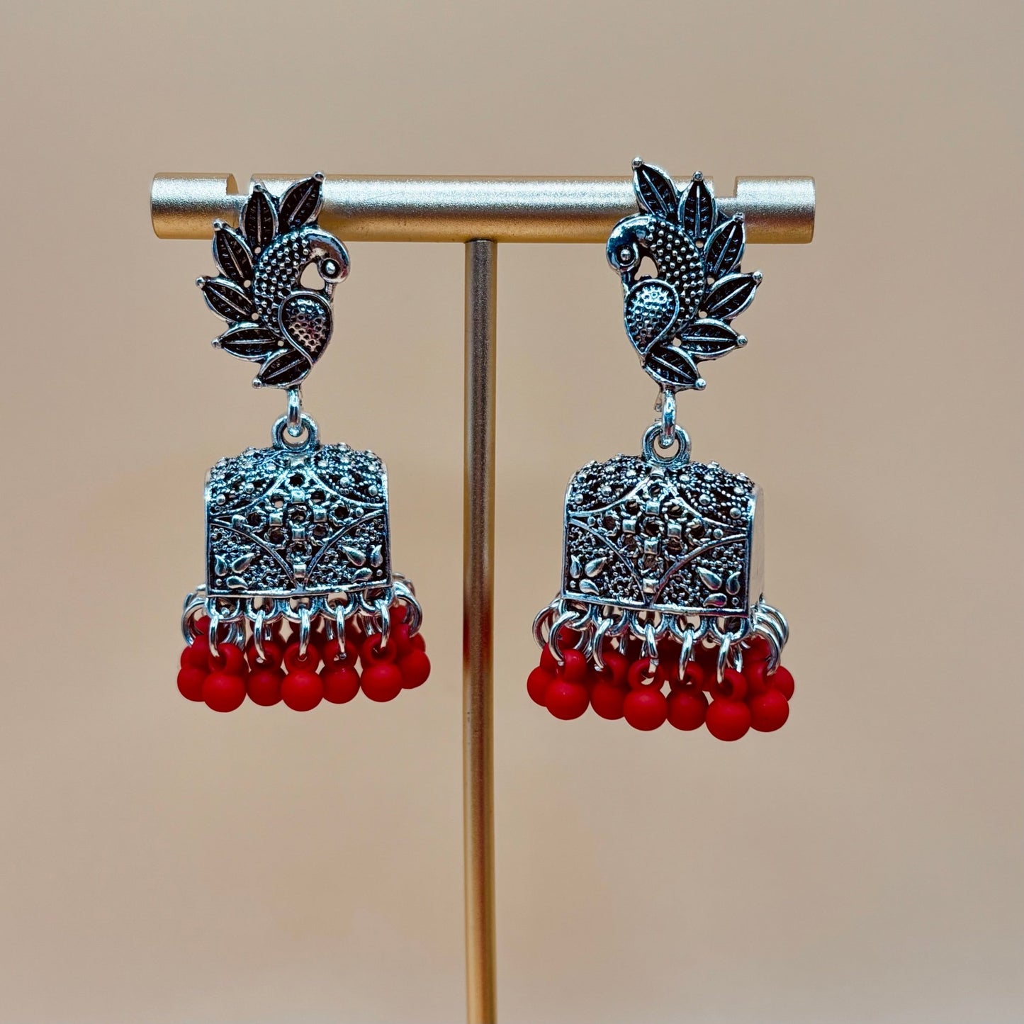 • Clothing: Embroidered/Printed suit for women - Made of best quality fabric - lawn or linen or chiffon - pure silk - Available at Najma Designs & Co. • Jewelry: Gold - plated stud earrings for