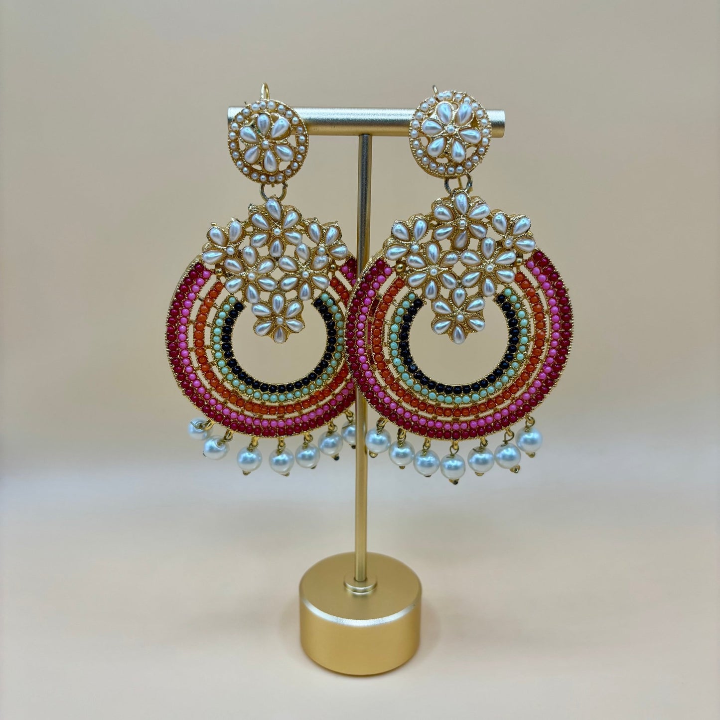 • Clothing: Embroidered/Printed suit for women - Made of best quality fabric - lawn or linen or chiffon - pure silk - Available at Najma Designs & Co. • Jewelry: Gold - plated stud earrings for