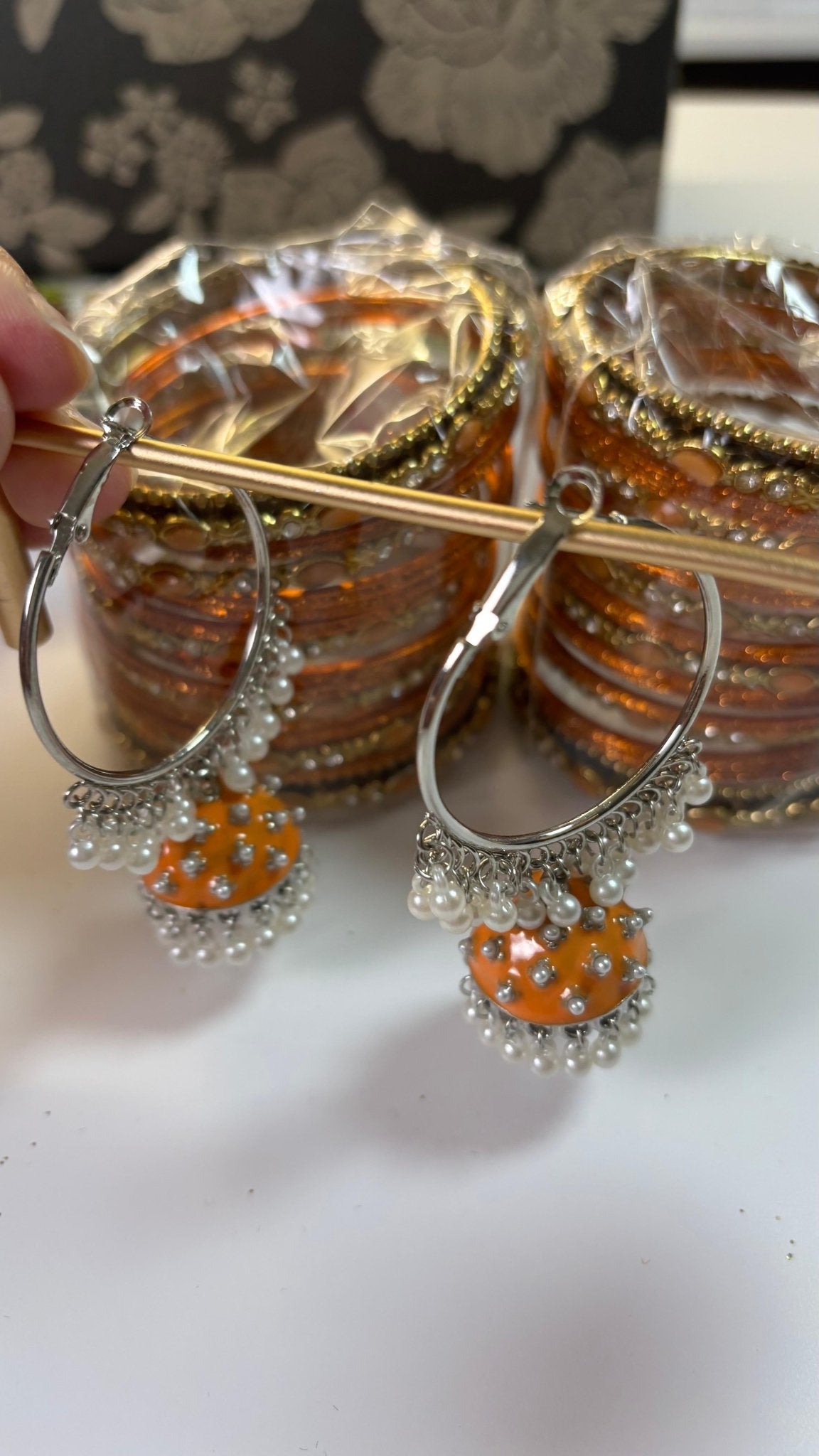 • Clothing: Embroidered/Printed suit for women - Made of best quality fabric - lawn or linen or chiffon - pure silk - Available at Najma Designs & Co. • Jewelry: Gold - plated stud earrings for
