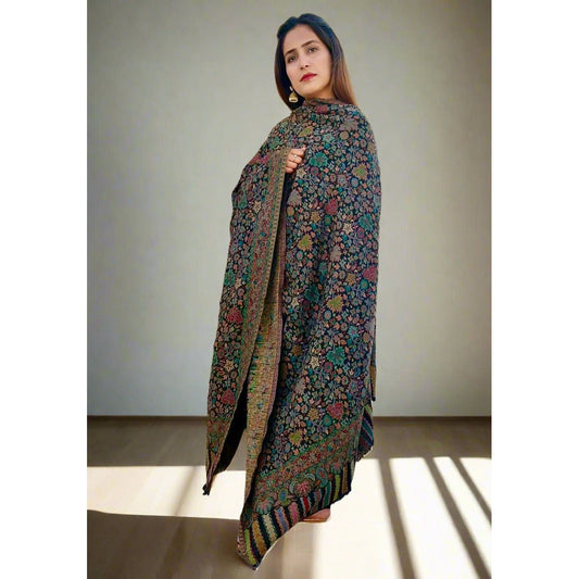 Expertly crafted in Pakistan, the Kani Shawl Pashmina from Najma designs and co is a one-of-a-kind piece that exudes luxury. The muted red hue pairs beautifully with the multicolor hand woven design, providing both warmth and style. Elevate any outfit with this exquisite pashmina.