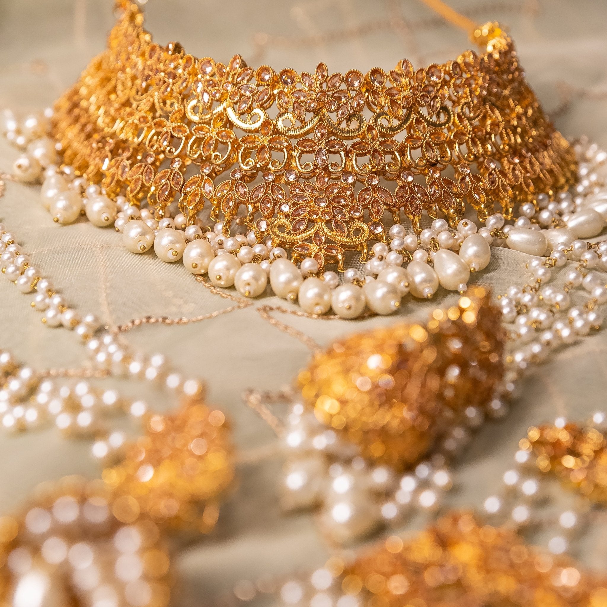 • Clothing: Embroidered/Printed suit for women - Made of best quality fabric - lawn or linen or chiffon - pure silk - Available at Najma Designs & Co. • Jewelry: Gold - plated stud earrings for