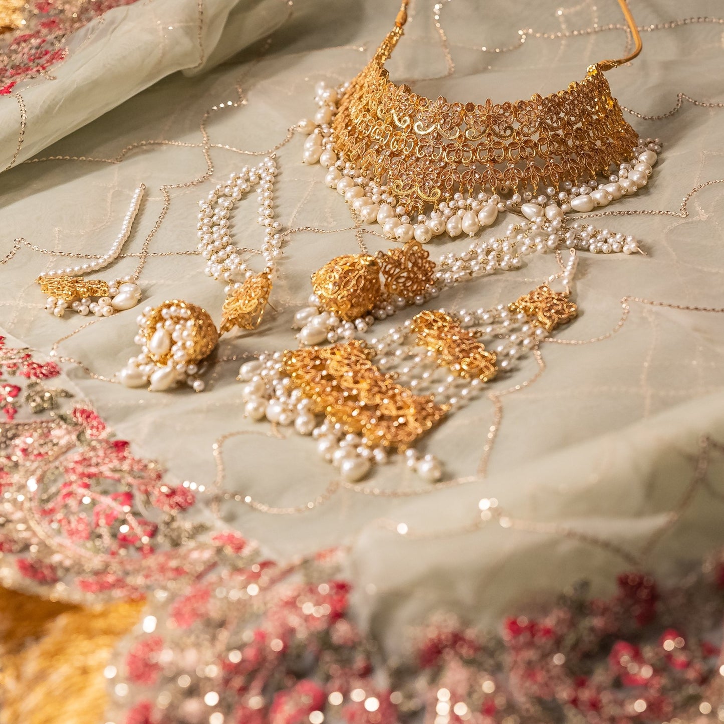 • Clothing: Embroidered/Printed suit for women - Made of best quality fabric - lawn or linen or chiffon - pure silk - Available at Najma Designs & Co. • Jewelry: Gold - plated stud earrings for