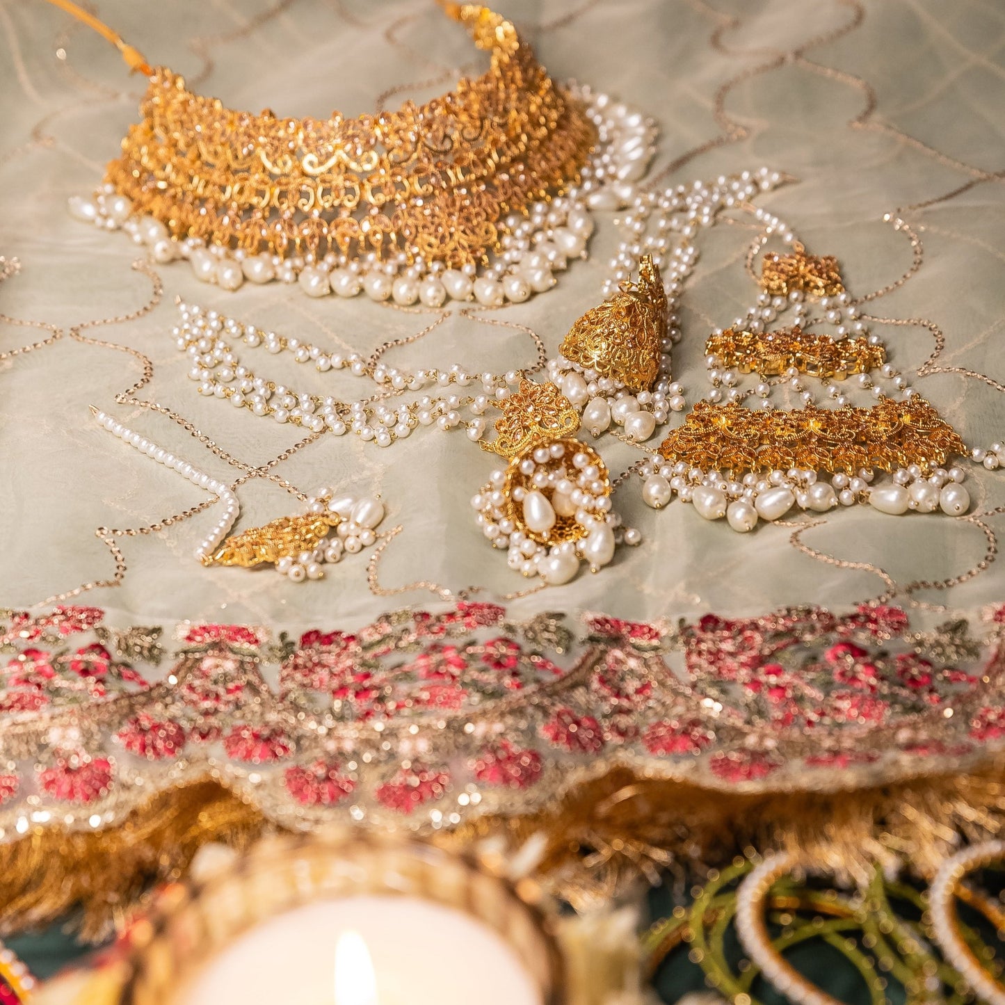 • Clothing: Embroidered/Printed suit for women - Made of best quality fabric - lawn or linen or chiffon - pure silk - Available at Najma Designs & Co. • Jewelry: Gold - plated stud earrings for