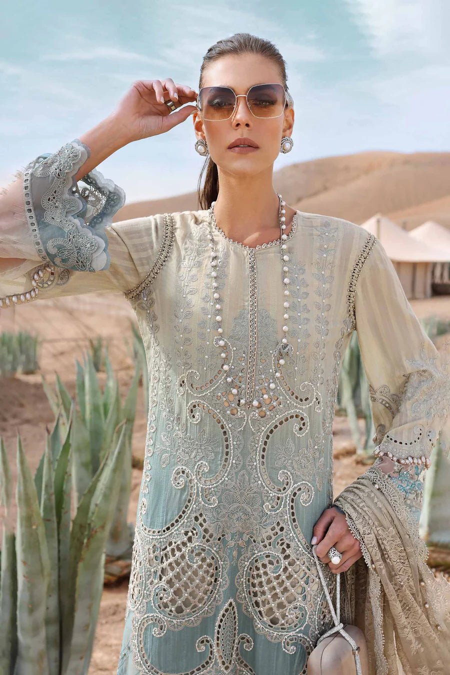 • Clothing: Embroidered/Printed suit for women - Made of best quality fabric - lawn or linen or chiffon - pure silk - Available at Najma Designs & Co. • Jewelry: Gold - plated stud earrings for