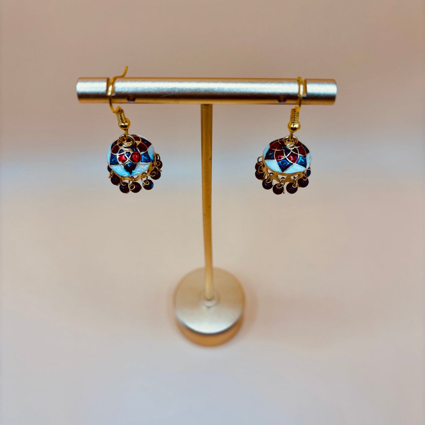 • Clothing: Embroidered/Printed suit for women - Made of best quality fabric - lawn or linen or chiffon - pure silk - Available at Najma Designs & Co. • Jewelry: Gold - plated stud earrings for