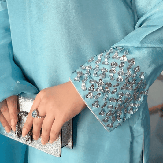 • Clothing: Embroidered/Printed suit for women - Made of best quality fabric - lawn or linen or chiffon - pure silk - Available at Najma Designs & Co. • Jewelry: Gold - plated stud earrings for