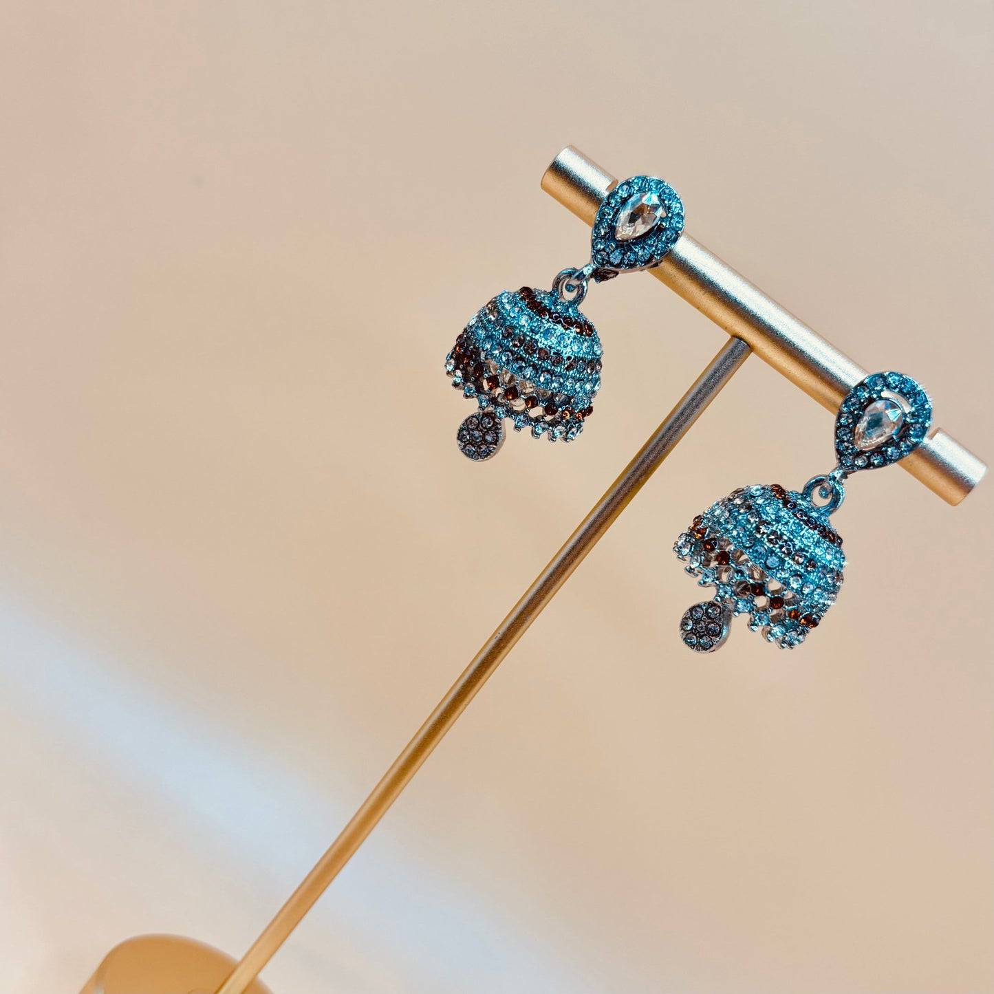 • Clothing: Embroidered/Printed suit for women - Made of best quality fabric - lawn or linen or chiffon - pure silk - Available at Najma Designs & Co. • Jewelry: Gold - plated stud earrings for