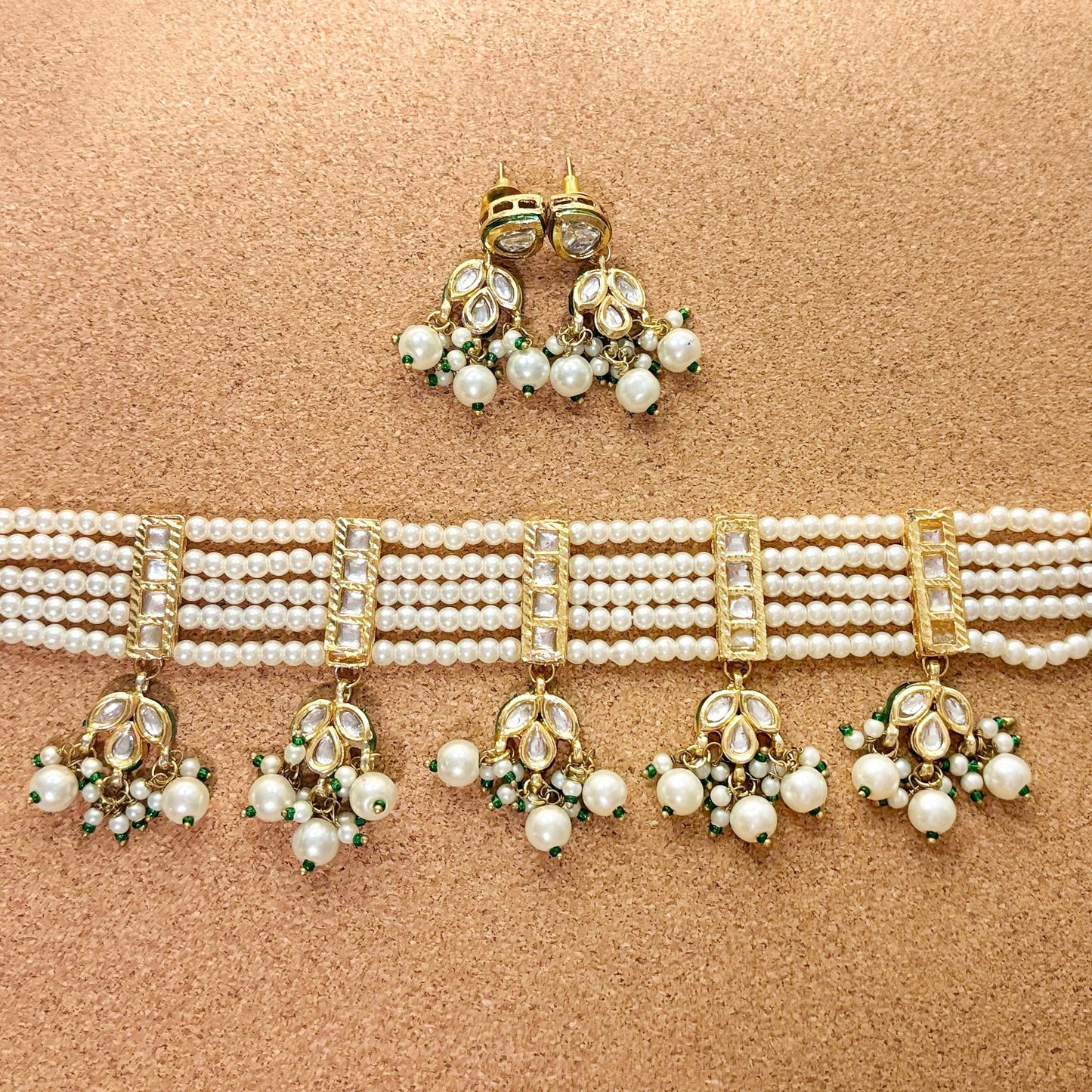 • Clothing: Embroidered/Printed suit for women - Made of best quality fabric - lawn or linen or chiffon - pure silk - Available at Najma Designs & Co. • Jewelry: Gold - plated stud earrings for