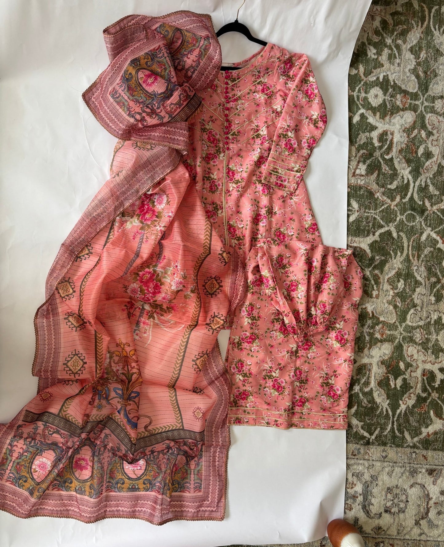 • Clothing: Embroidered/Printed suit for women - Made of best quality fabric - lawn or linen or chiffon - pure silk - Available at Najma Designs & Co. • Jewelry: Gold - plated stud earrings for