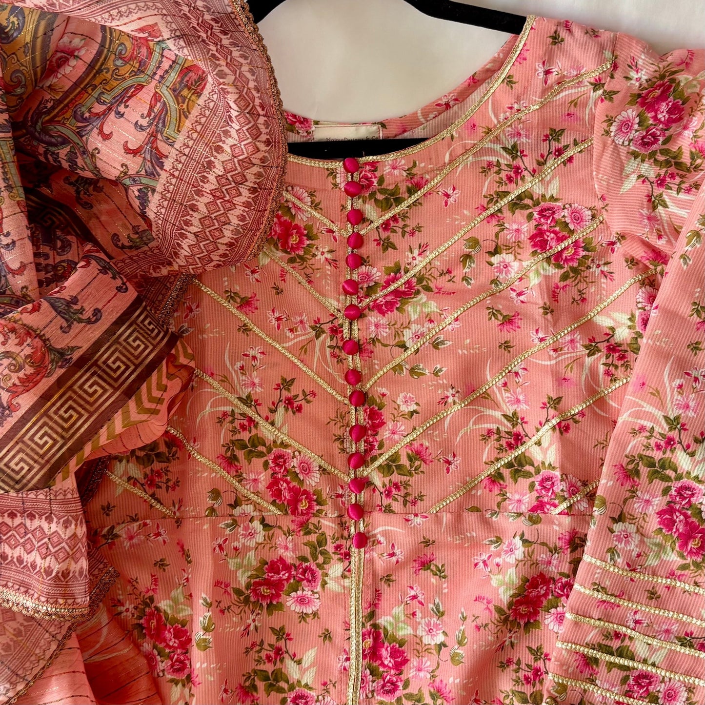 • Clothing: Embroidered/Printed suit for women - Made of best quality fabric - lawn or linen or chiffon - pure silk - Available at Najma Designs & Co. • Jewelry: Gold - plated stud earrings for