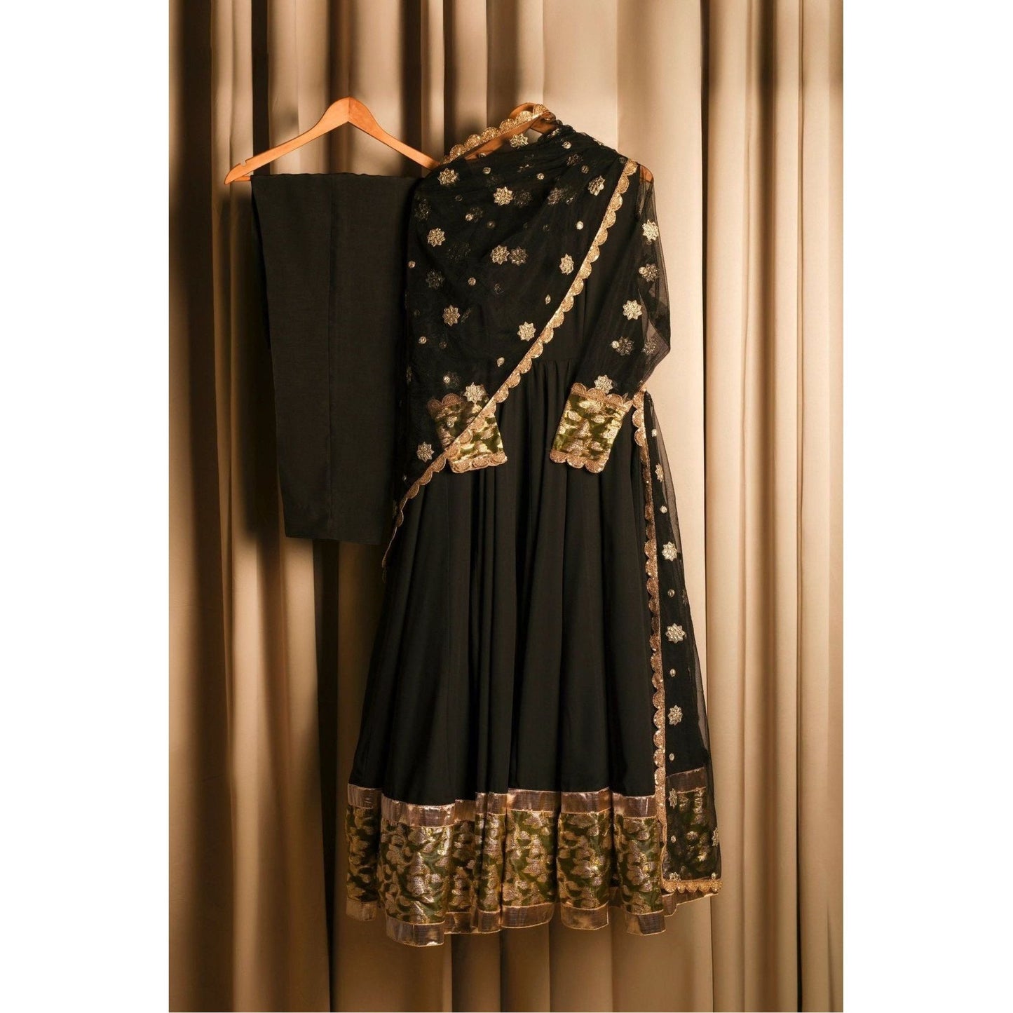 3 pieces of black pishwash Gown with kalliyan maxi banarasi tissue work on the bottom