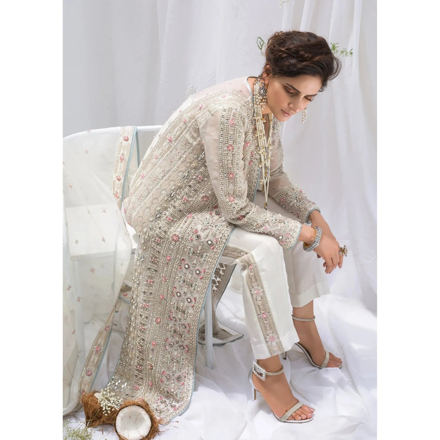 • Clothing: Embroidered/Printed suit for women - Made of best quality fabric - lawn or linen or chiffon - pure silk - Available at Najma Designs & Co. • Jewelry: Gold - plated stud earrings for