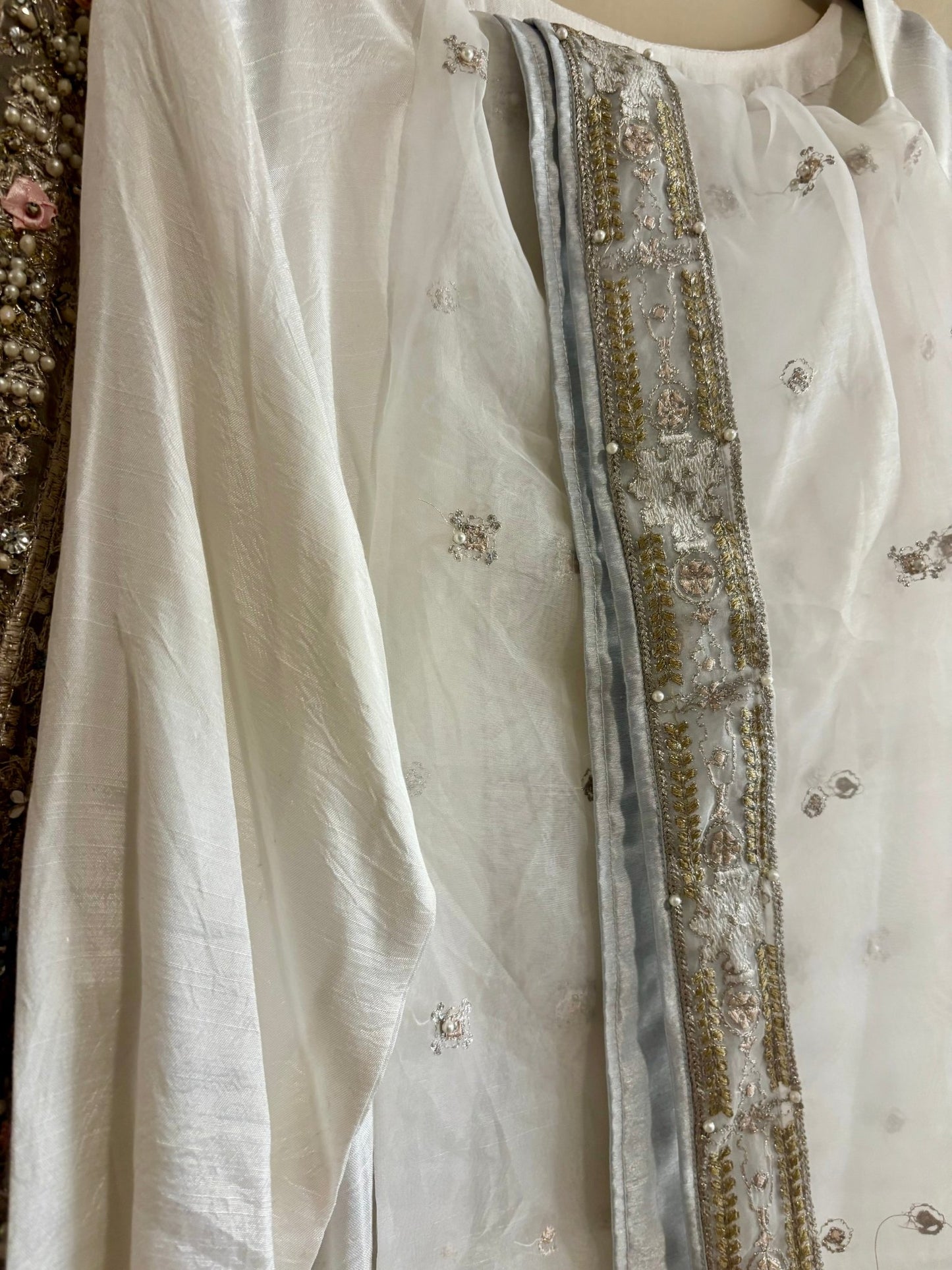 • Clothing: Embroidered/Printed suit for women - Made of best quality fabric - lawn or linen or chiffon - pure silk - Available at Najma Designs & Co. • Jewelry: Gold - plated stud earrings for
