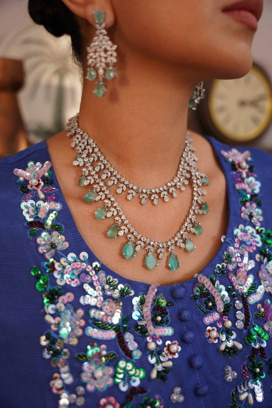 • Clothing: Embroidered/Printed suit for women - Made of best quality fabric - lawn or linen or chiffon - pure silk - Available at Najma Designs & Co. • Jewelry: Gold - plated stud earrings for