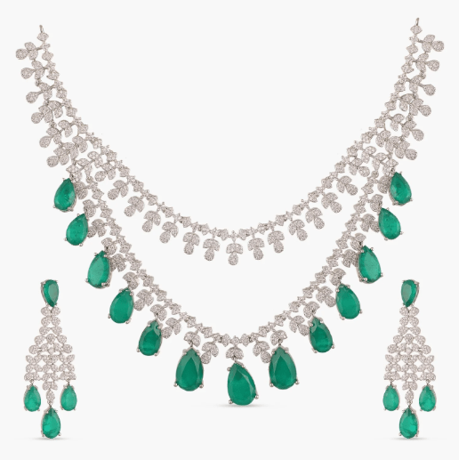 • Clothing: Embroidered/Printed suit for women - Made of best quality fabric - lawn or linen or chiffon - pure silk - Available at Najma Designs & Co. • Jewelry: Gold - plated stud earrings for