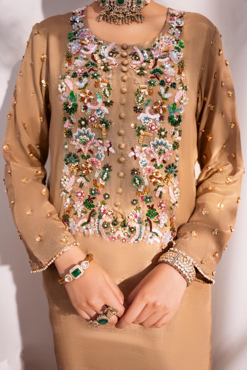 • Clothing: Embroidered/Printed suit for women - Made of best quality fabric - lawn or linen or chiffon - pure silk - Available at Najma Designs & Co. • Jewelry: Gold - plated stud earrings for