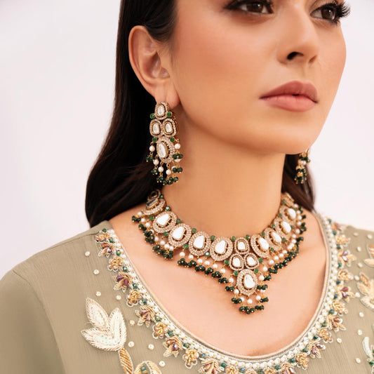 • Clothing: Embroidered/Printed suit for women - Made of best quality fabric - lawn or linen or chiffon - pure silk - Available at Najma Designs & Co. • Jewelry: Gold - plated stud earrings for