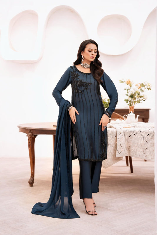 • Clothing: Embroidered/Printed suit for women - Made of best quality fabric - lawn or linen or chiffon - pure silk - Available at Najma Designs & Co. • Jewelry: Gold - plated stud earrings for