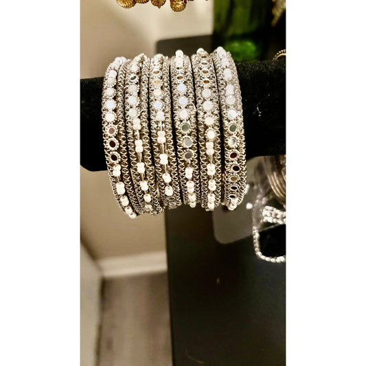 • Clothing: Embroidered/Printed suit for women - Made of best quality fabric - lawn or linen or chiffon - pure silk - Available at Najma Designs & Co. • Jewelry: Gold - plated stud earrings for