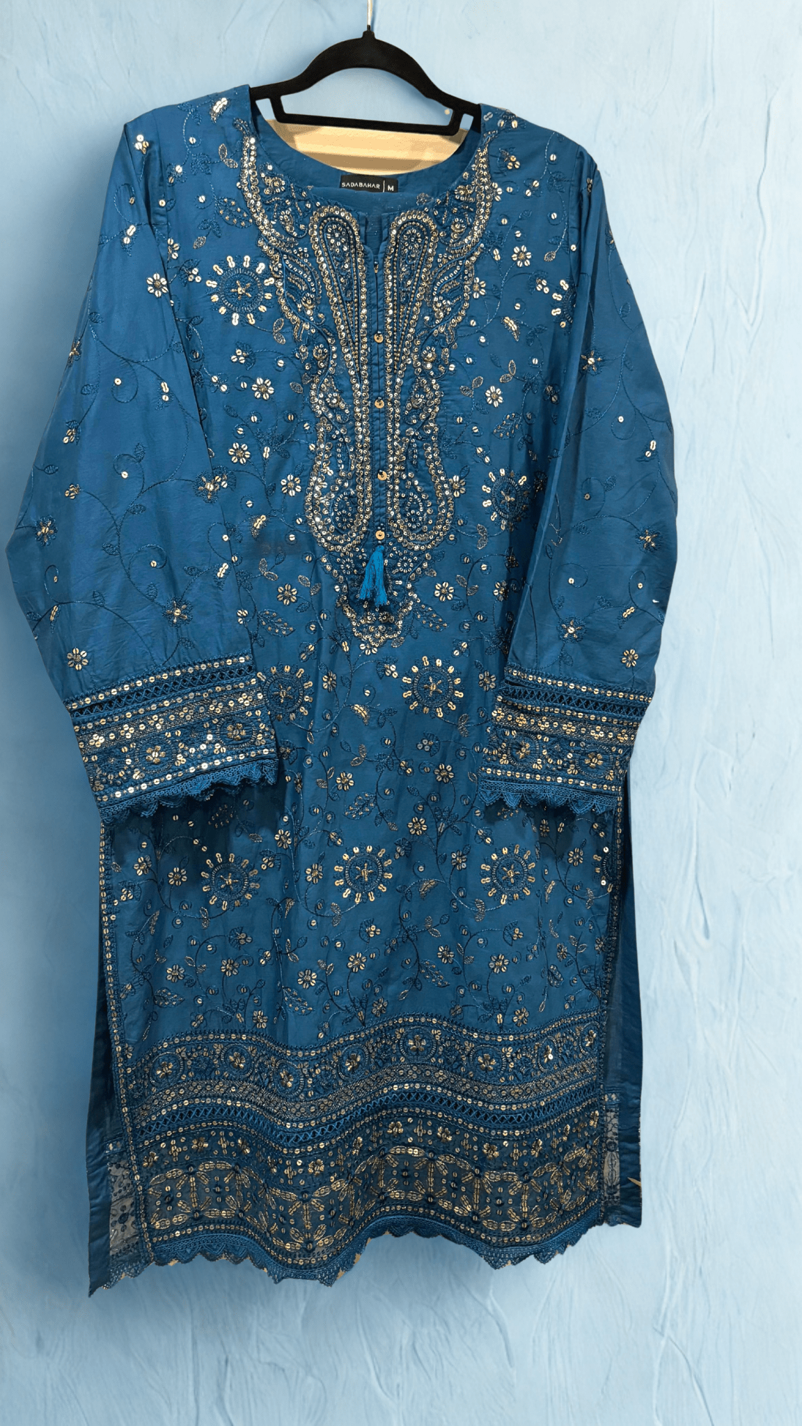 • Clothing: Embroidered/Printed suit for women - Made of best quality fabric - lawn or linen or chiffon - pure silk - Available at Najma Designs & Co. • Jewelry: Gold - plated stud earrings for