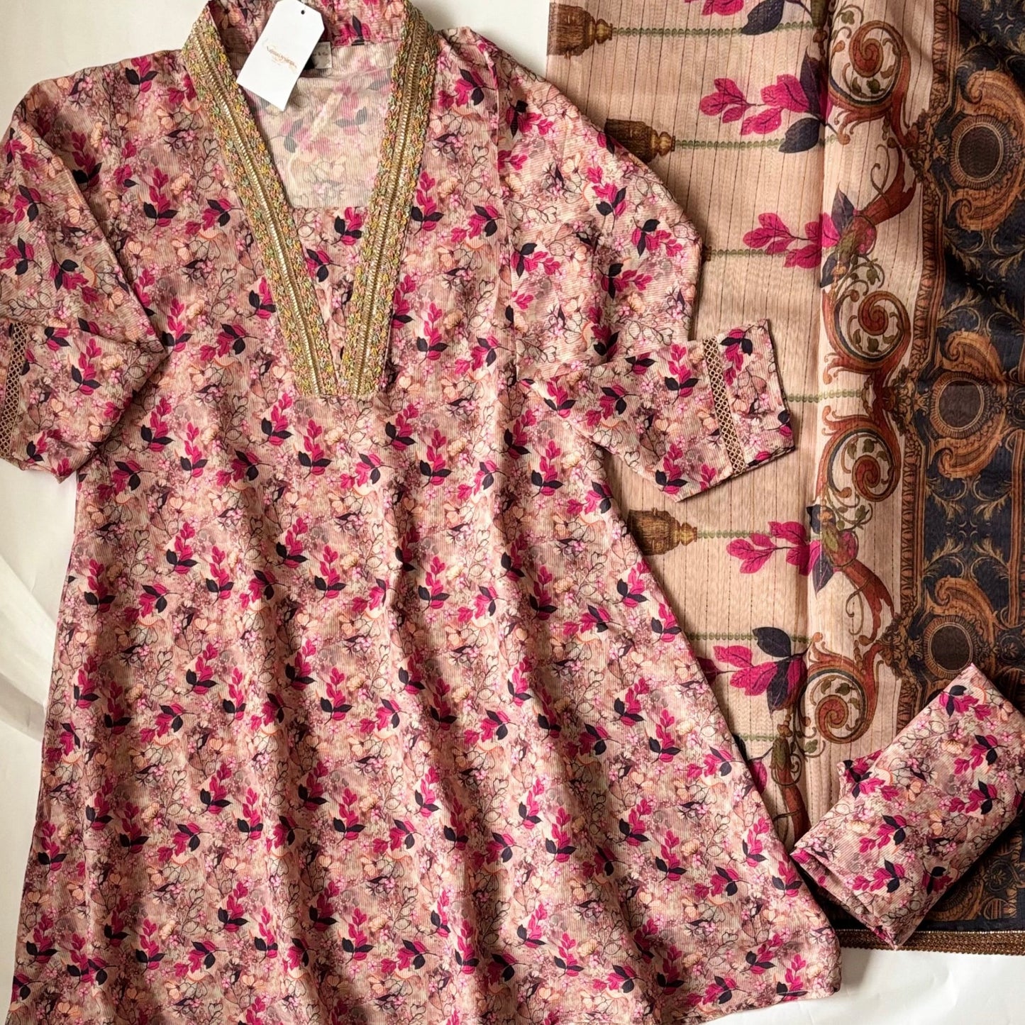 • Clothing: Embroidered/Printed suit for women - Made of best quality fabric - lawn or linen or chiffon - pure silk - Available at Najma Designs & Co. • Jewelry: Gold - plated stud earrings for