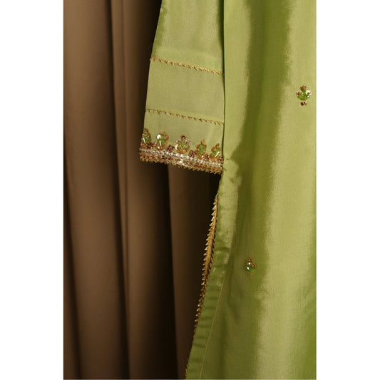 close up of Product Description: Beautiful raw silk Gharara suit with gold hand embroidery with crystals Color: Lime green.