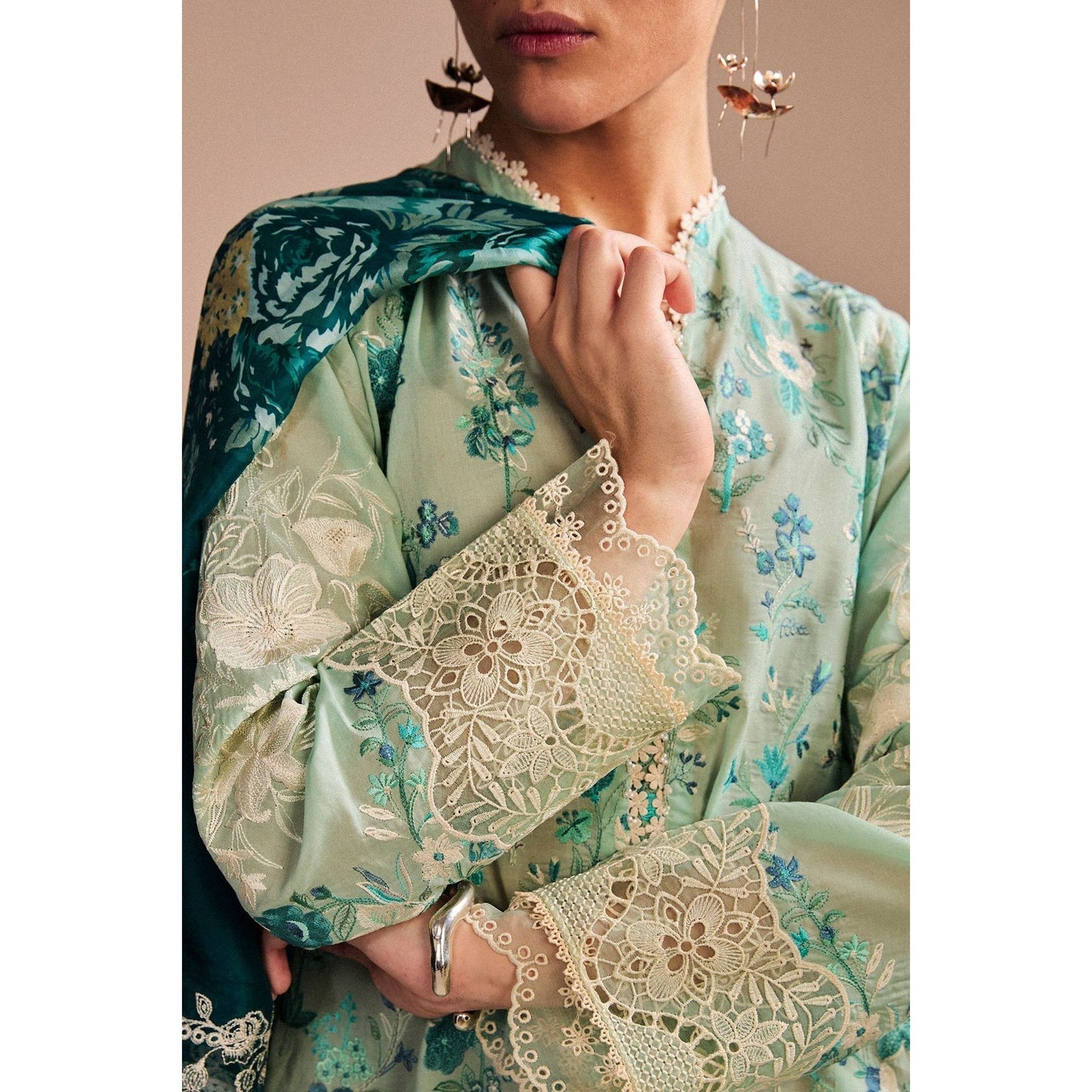 • Clothing: Embroidered/Printed suit for women - Made of best quality fabric - lawn or linen or chiffon - pure silk - Available at Najma Designs & Co. • Jewelry: Gold - plated stud earrings for
